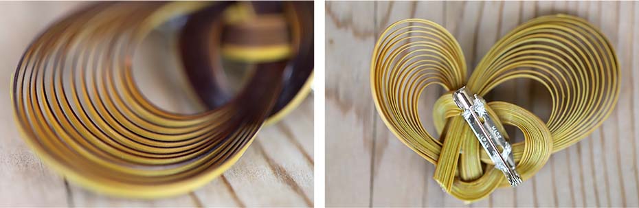 竹を束ねたハート型のブローチの細部