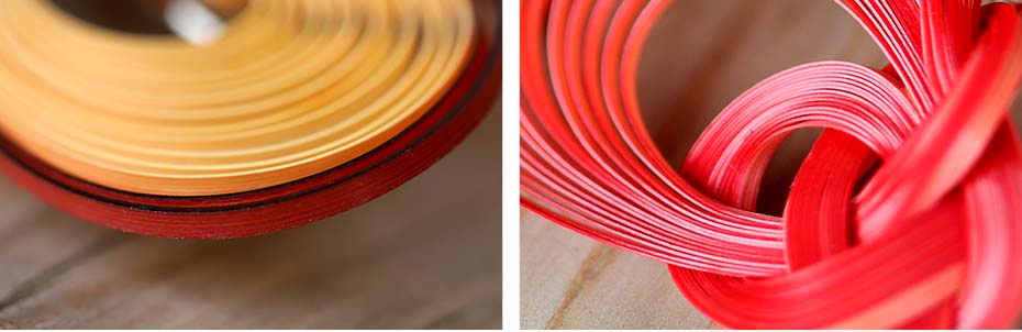 緻密に編み上げた竹を束ねたハート型のブローチ